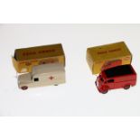 Two Dinky Toys diecast model vehicles; 253 Daimler ambulance with cream body, red crosses and red