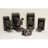 Five antique folding plate cameras to include two Eastman Kodak No. 3-A folding pocket Kodak model