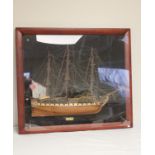 Large framed model of the ship USS Constitution.