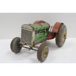British made tinplate model of a Tractor in the manner of Mettoy, 24cm long