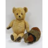 Antique straw filled mohair guinea pig 22cm long and a growler teddy bear with articulated limbs