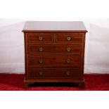 Victorian mahogany and inlaid small chest of two short over three long drawers, the shaped pillar