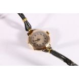9ct gold cased wristwatch with Swiss 15 jewel movement on black leather strap, 15.4g gross
