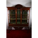 Edwardian mahogany Chippendale style fret work astragal glazed two door display cabinet, shaped