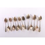 Set of six Georgian silver tea spoons of oar pattern by maker HS and eight further silver spoons,