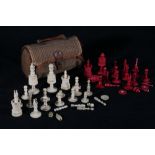Woven bag containing various white and red stained 19th century ivory chess pieces, (incomplete)