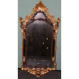 Chippendale style gilt pier glass mirror in the Rococo manner of rectangular form with pierced