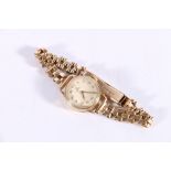 9ct gold cased Omega wristwatch with 15 jewel movement (numbered 10774663) on 9ct gold bracelet,