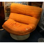 1960s mid 20th century modern fiberglass swivel lounge chair with orange upholstery in the manner of