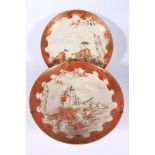 Two large Japanese Kutani dishes, one decorated with a Samurai handing a scroll to a seated female