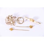 9ct gold floral spray brooch 5g 3.5cm wide, a 9ct gold bar brooch with crown surmount 3g, a 15ct