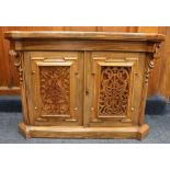 19th century rosewood chiffonier having pierced fret carved door panels raised on plinth, 113cm