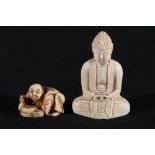 A carved ivory seated Buddha figure, 6cm and a small netsuke depicting a man grinding rice, 3.5cm (