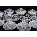 Chinese dinner set decorated with fruits, flowers and butterflies comprising 12 dinner plates, 12