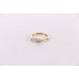 18ct gold diamond five stone ring, the central stone less than 0.1ct, size J, 2.2g gross