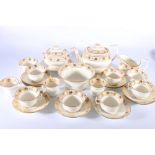 Antique gilt fruiting vine pattern china twenty-seven piece part tea set comprising teapot with