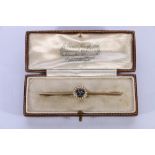 9ct yellow gold sapphire and seed pearl bar brooch, stamped 9ct, 7cm long, 3.0g gross in Wilson &