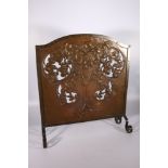 Arts & Crafts repousse copper fire screen with fruiting tree design in the Glasgow School manner,