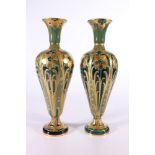 Pair of MacIntyre Moorcroft Burslem Florian ware vases with pipelined decoration of gilded flowers