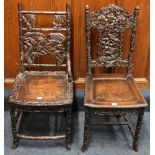 Two antique Chinese padauk wood side chairs, both profusely carved and pierced with designs of birds