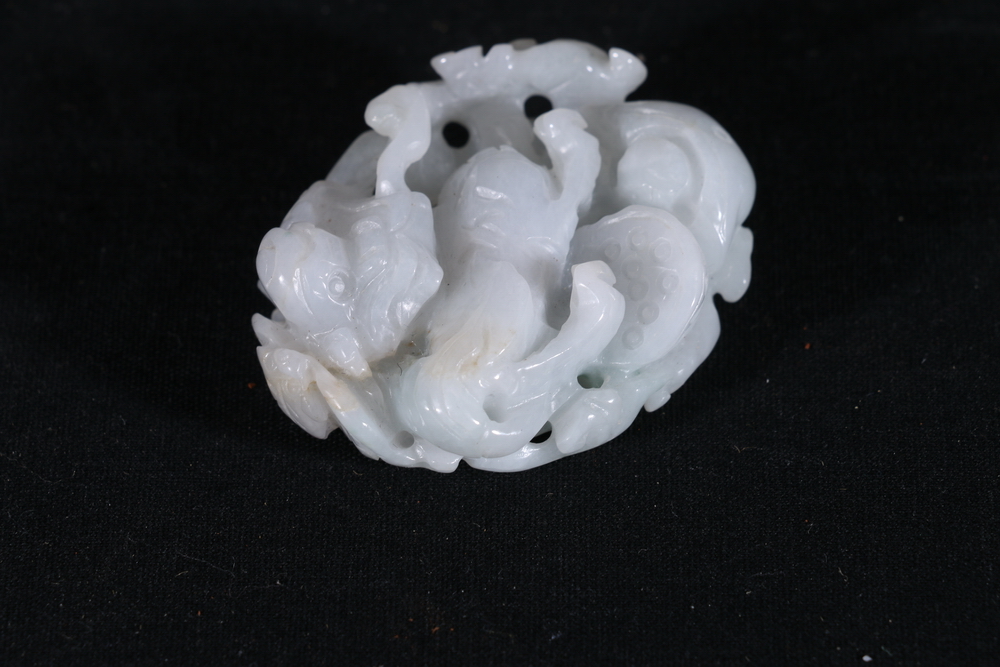 Chinese carved and pierced hardstone pendant of a blue/grey stone depicting a dragon amongst clouds, - Image 2 of 3