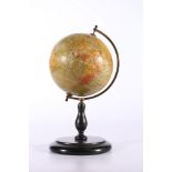 Philip's 6 inch Terrestrial Globe by George Phillp & Son Ltd, raised on wood stand, 29cm