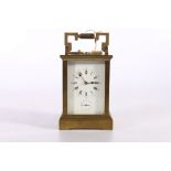 Antique French repeater carriage clock, the white enamel dial with Roman and Arabic numerals and
