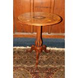 19th century walnut and mahogany tilt-top table, the oval top inlaid with marquetry floral design,
