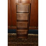 Mahogany bookcase in the manner of Whytock and Reid of Edinburgh, raised on block feet, 112cm tall