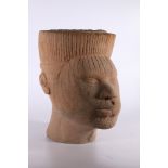 Large carved sandstone sculpture in the form of a African male head, 40cm