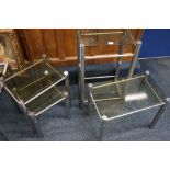 Four mid 20th century design chromed tubular metal and smoked glass occasional table in the manner