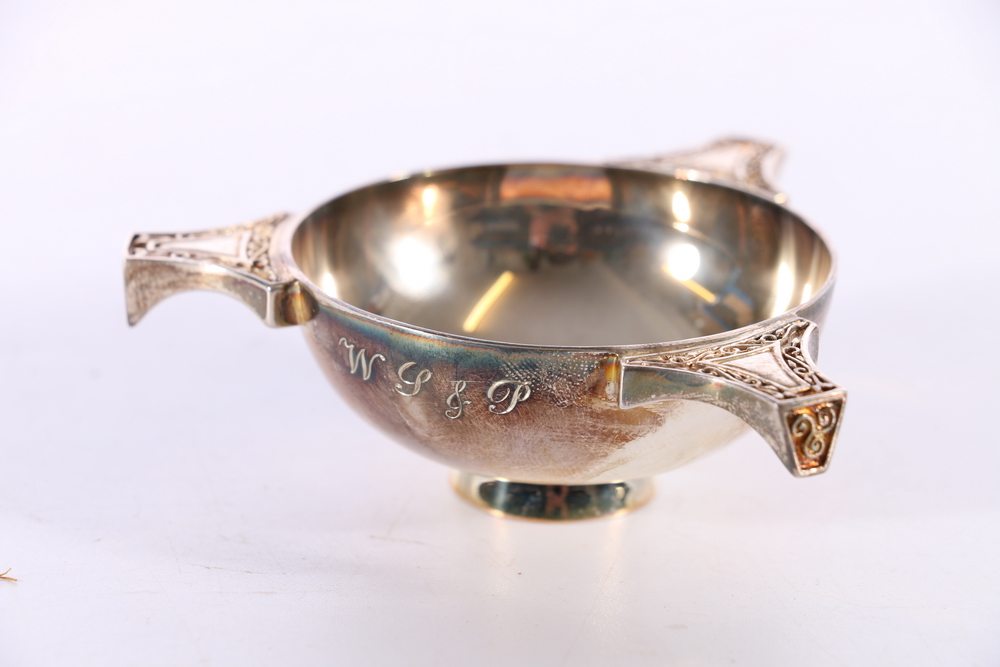 Small silver quaich like tyg by Hamilton and Inches Edinburgh 1999 with 2000 mark, bowl diameter 6.