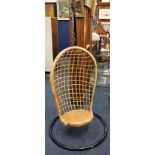 Mid 20th century rattan egg chair with metal swing pendant stand after the design by Nanna Ditzel,