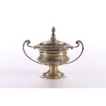 Edwardian Art Nouveau period silver urn and cover decorated in the Adams style with garlands,