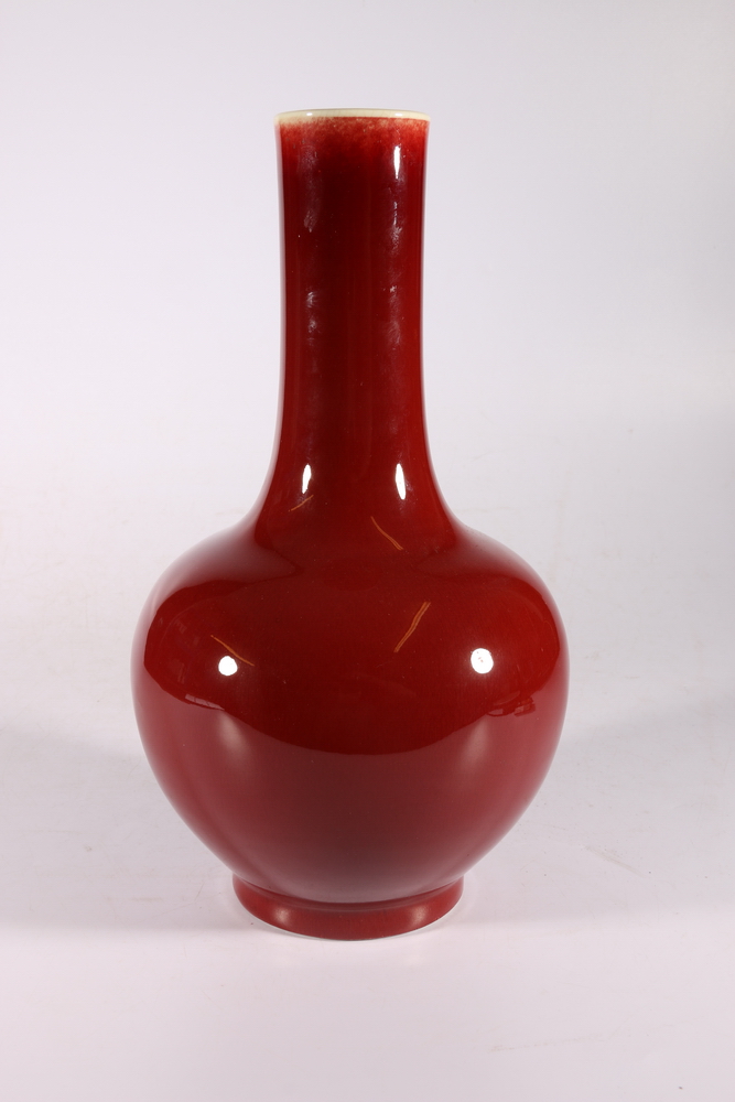 A 19th or early 20th century Chinese flambé glazed bottle vase, 33cm