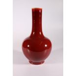 A 19th or early 20th century Chinese flambé glazed bottle vase, 33cm