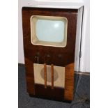 Columbia free standing television set, the body with gilt speaker cover and a screen.