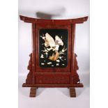 Japanese lacquered firescreen, the red lacquer with floral detail, with inset bone and mother of