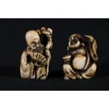 Ivory netsuke of Fukurukuju holding a fan and a staff and another of a seated Hotei, by the same