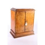 Victorian walnut apprentice piece type small three-drawer table-top cabinet, 36cm tall