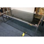 Mid 20th century modern chromed metal and smoked glass coffee table in the manner of Pieff, 61cm x