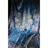 A fine needlework silk throw decorated with Arabian desert scene, palm trees, camels, temples