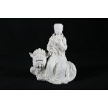 Mid 20th century Chinese blanc de Chine model of a dancing figure and kneeling attendant offering