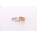 9ct yellow gold signet style ring, size L/M, 2.4g and a white metal plain wedding band ring makers