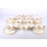 Royal Crown Derby Vine pattern twenty-one piece tea set comprising nine tea cups, four saucers and