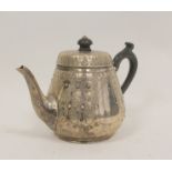Silver tea pot of tapering shape chased with panels with the signs of the zodiac, by Charles Edwards