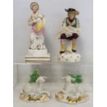 Pair of Continental Chelsea style figures of recumbent lambs with bocage back, each 9.5cm long and