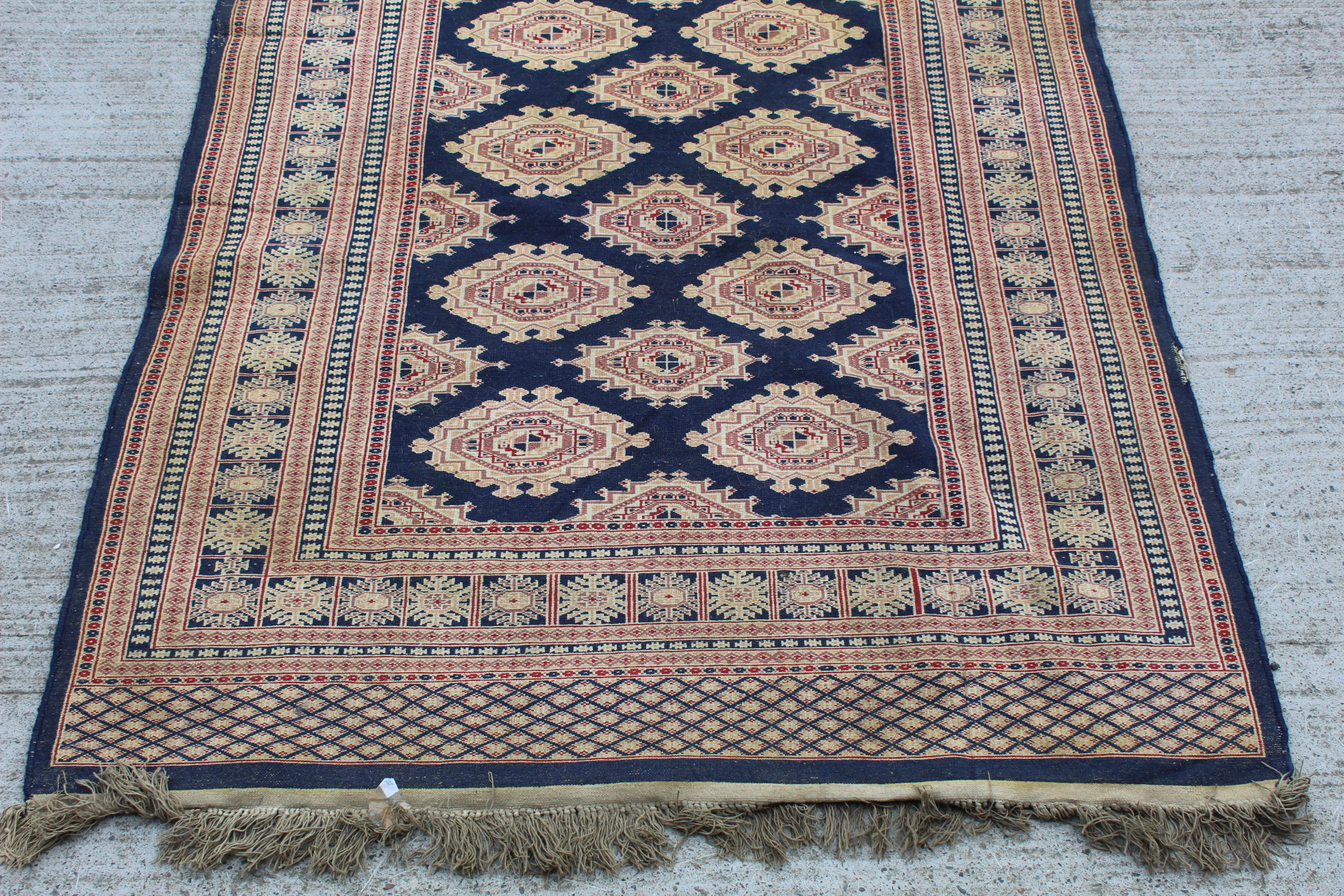 Eastern wool rug with multiple hooked octagonal medallions on blue field, 201cm x 124cm. - Image 7 of 12