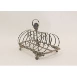 Silver toast rack for six with looped wires upon gadrooned and scalloped base and feet, John