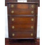 Edwardian shaped top chest of five graduated drawers with central inlaid panel flanked by reeded